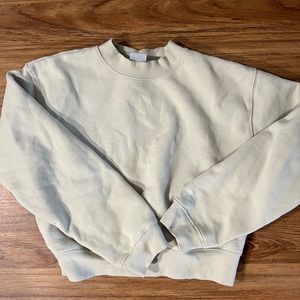 TNA cropped cozy fleece sweatshirt.